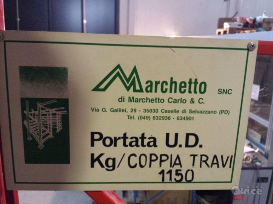 MULETTO ELETTRICO CON BINARIO E SCAFFALATURE DA MAGAZZINO foto-332666