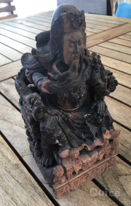Statuetta in legno esotico, molto pesante, intagliata  a mano. foto-48625