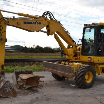 2010 Komatsu PW98MR-6 escavatore gommato