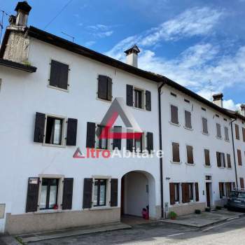 Porzione terra-cielo con depositi e terreno escl. a Borgo Valbelluna