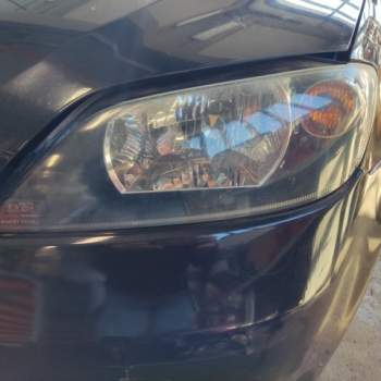 Proiettore sinistro MAZDA 2  del 2004